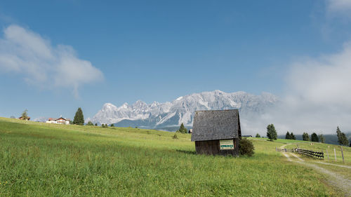 Panoramic view of field against sky