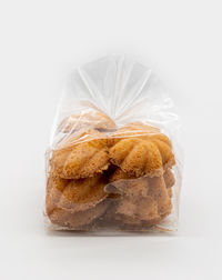 High angle view of cake against white background