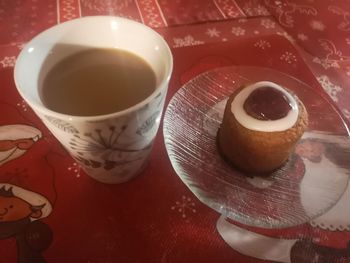 High angle view of coffee cup on table