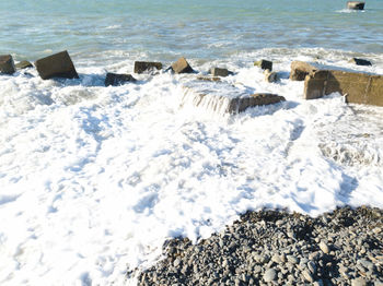 High angle view of rocks on beach