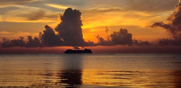 Scenic view of sea against sky during sunset