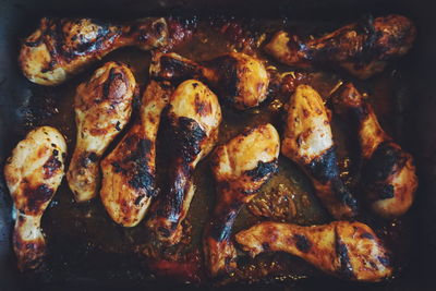 High angle view of meat on barbecue