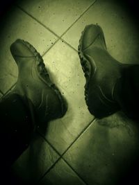 High angle view of wet tiled floor