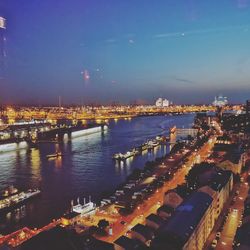 High angle view of illuminated city at night
