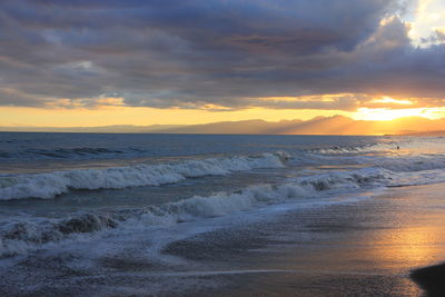 Scenic view of sea against sky during sunset