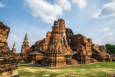 Wat mahathat prang or stupas and surrounding ruins scenery in ayutthaya, thailand