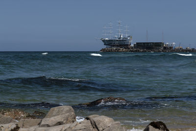 Scenic view of sea against clear sky