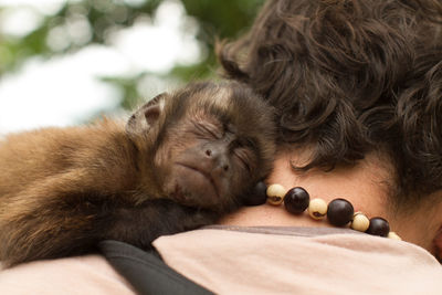 Close-up of young man sleeping