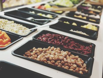 Various food in containers at restaurant