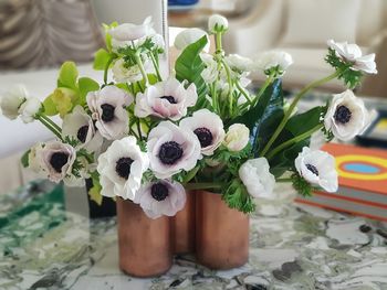 Close-up of white flowers on table