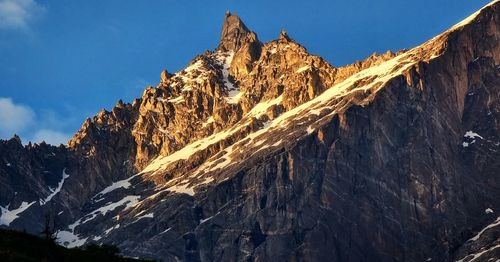 Panoramic view of rocky mountains against sky