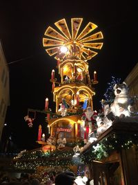 Low angle view of illuminated building at night