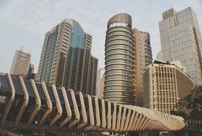 Low angle view of modern buildings against sky