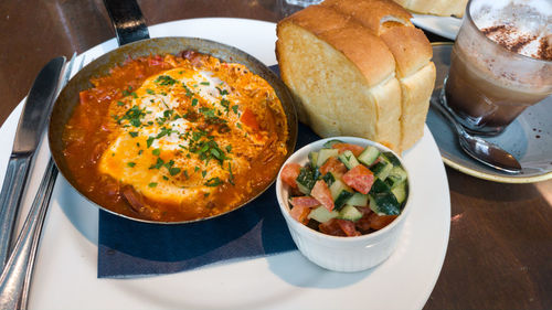 High angle view of breakfast served on table