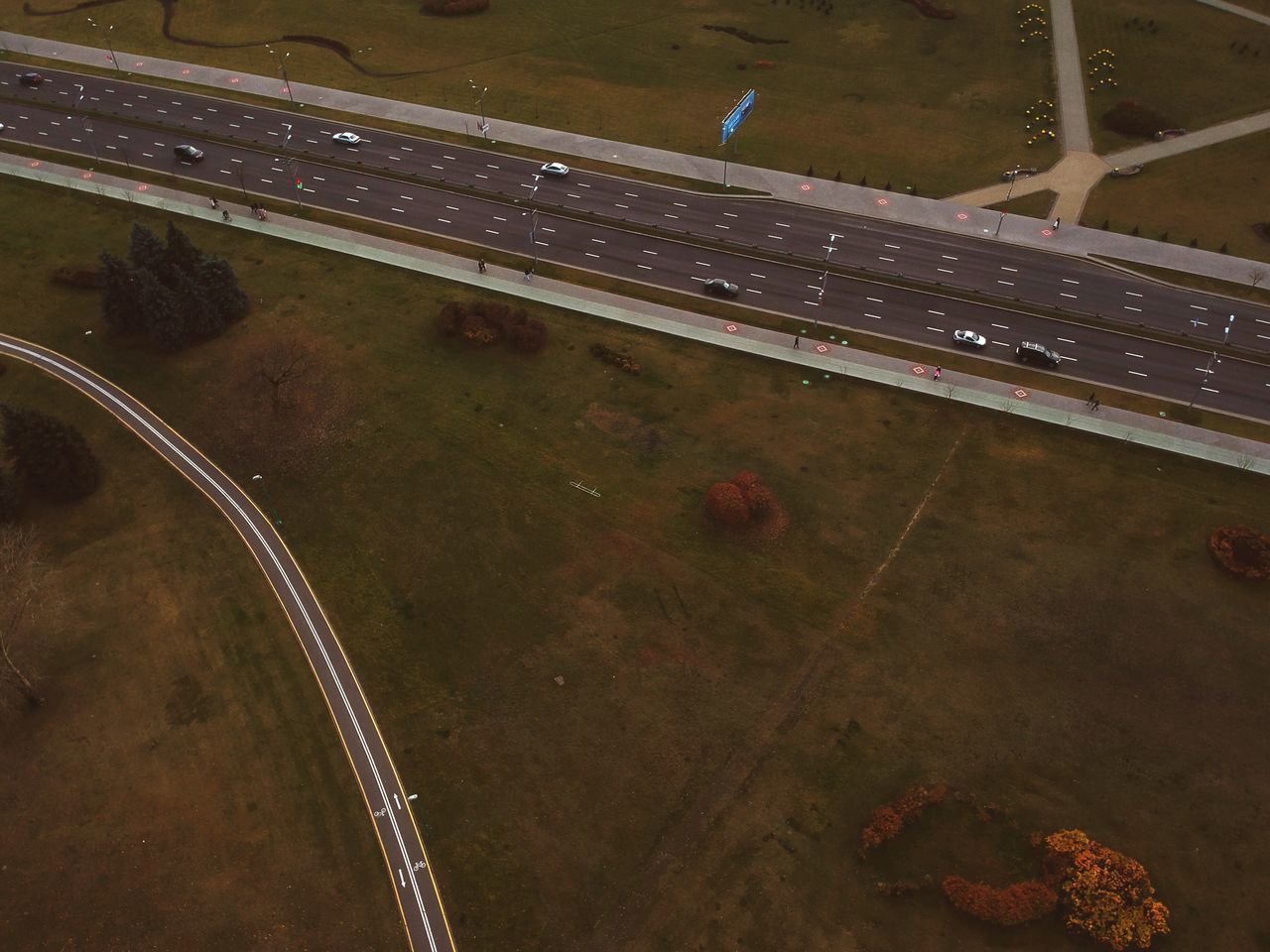 HIGH ANGLE VIEW OF AIRPLANE ON ROAD