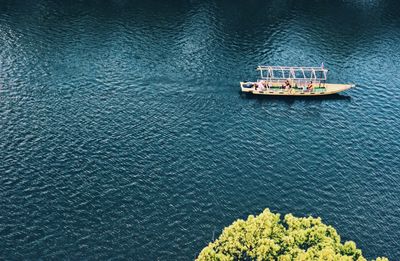 High angle view of ship sailing in sea