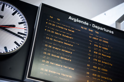Low angle view of departure board