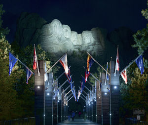 Low angle view of flags at night