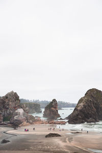 Scenic view of beach against clear sky