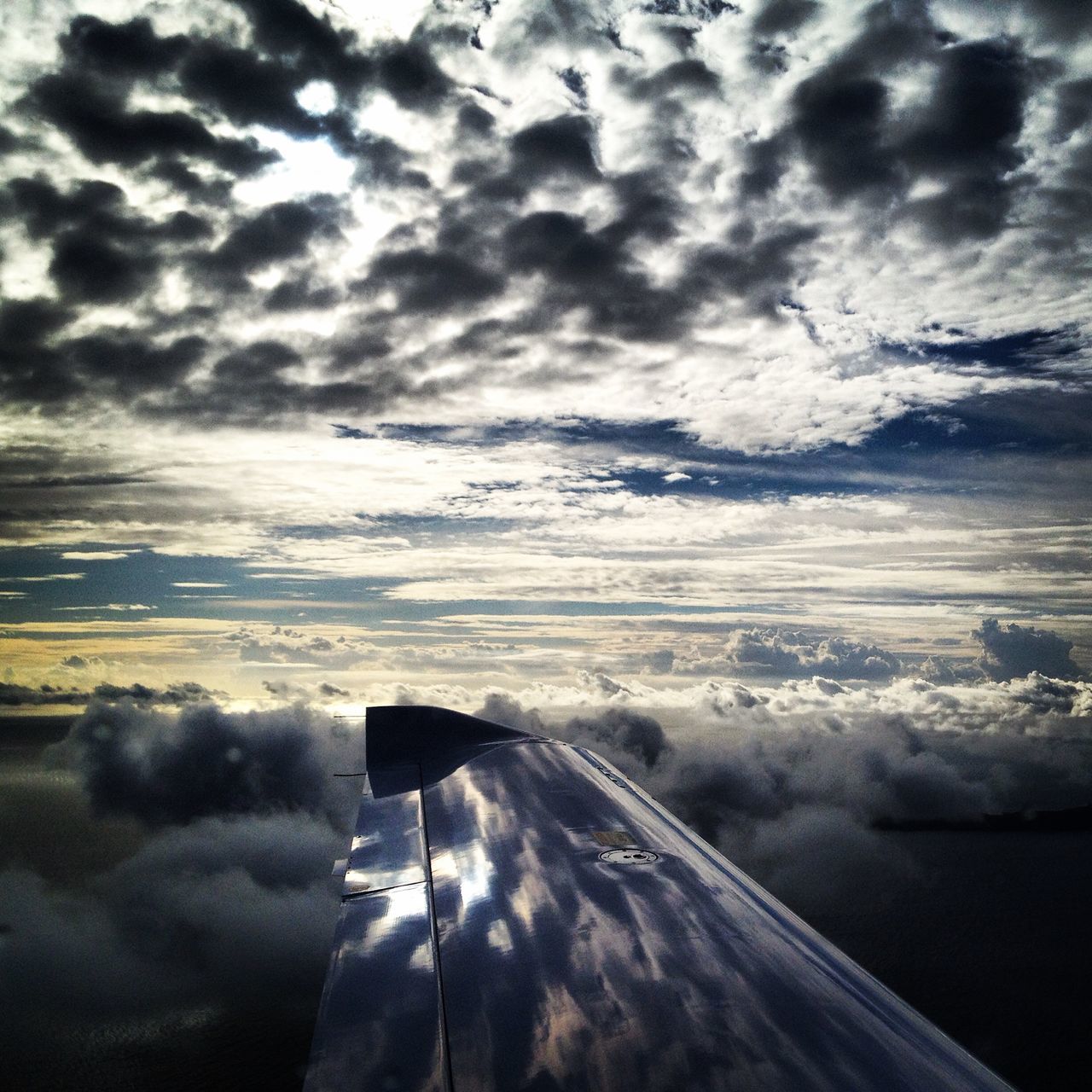 sky, cloud - sky, sea, cloudy, scenics, weather, beauty in nature, water, nature, horizon over water, tranquility, tranquil scene, cloud, transportation, beach, airplane, cloudscape, idyllic, shore, outdoors