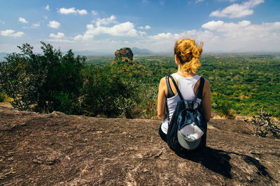 Rear view of female tourist in sri lanka