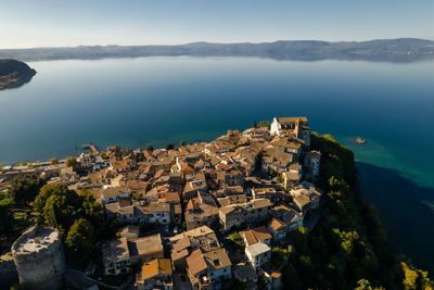 Aerial high angle view of an italian townscape by sea, drone 