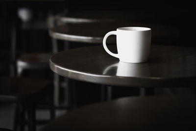 Close-up of coffee cup on table