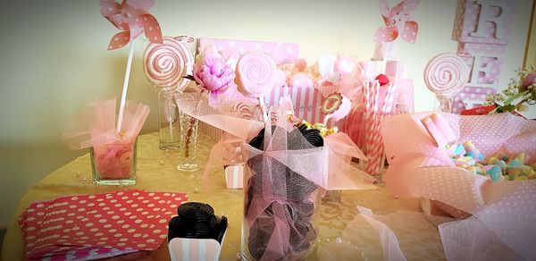 Close-up of pink flowers on table