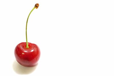 Close-up of strawberry over white background