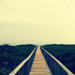 Footbridge leading to sea