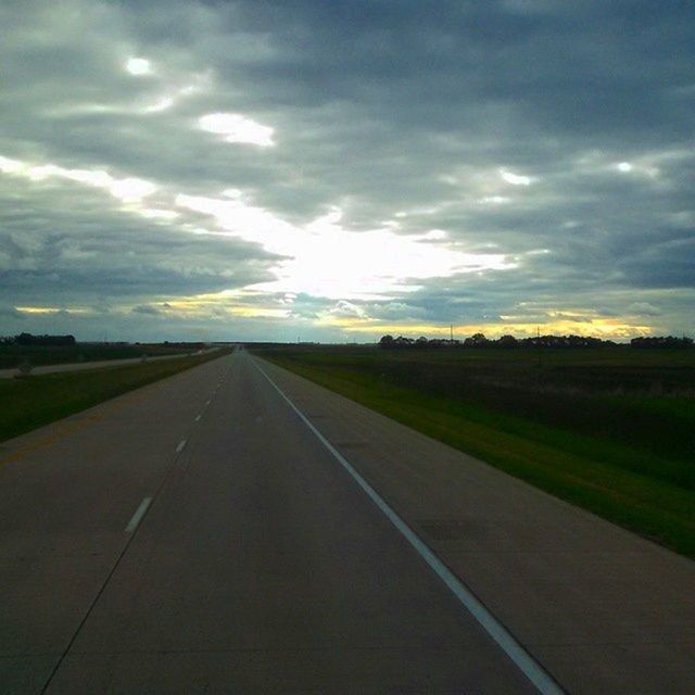 the way forward, sky, sunset, cloud - sky, transportation, diminishing perspective, road, vanishing point, sun, cloudy, tranquility, tranquil scene, scenics, landscape, cloud, beauty in nature, nature, sunlight, sunbeam, country road