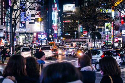 Group of people in city at night