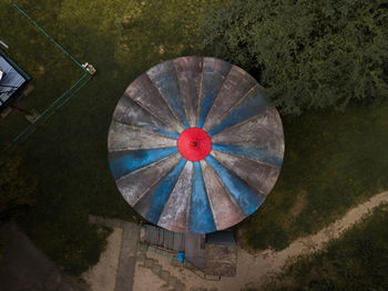 High angle view of wheel by wall