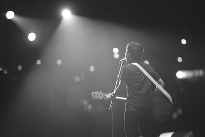 Singer singing at concert