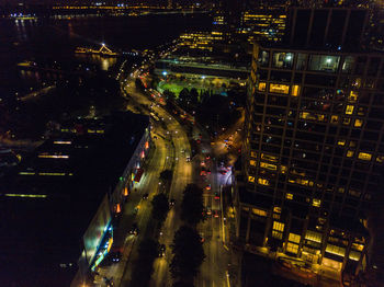 High angle view of illuminated cityscape at night