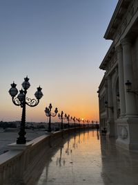 Buildings against sky during sunset