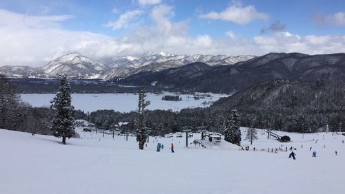 Scenic view of snowcapped mountains against sky