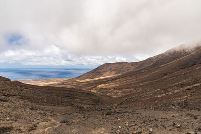 Scenic view of desert against sky