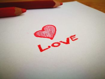 Close-up of heart shape on paper