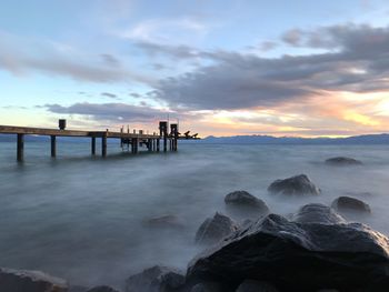 Scenic view of sea against sky during sunset