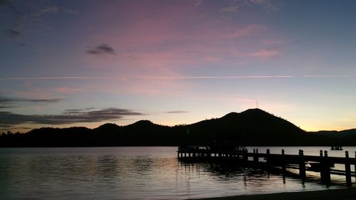 Scenic view of lake at sunset