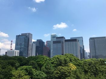 Low angle view of skyscrapers against sky