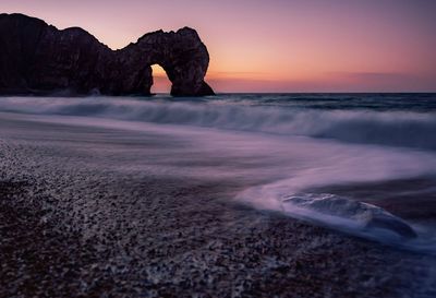 Scenic view of sea against sky during sunset