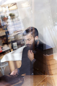 Young hipster businessman on break for a coffee