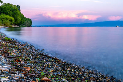 Scenic view of sea against sky during sunset