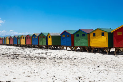 Beach huts against sky