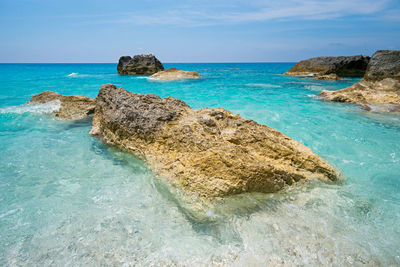 Scenic view of sea shore against sky