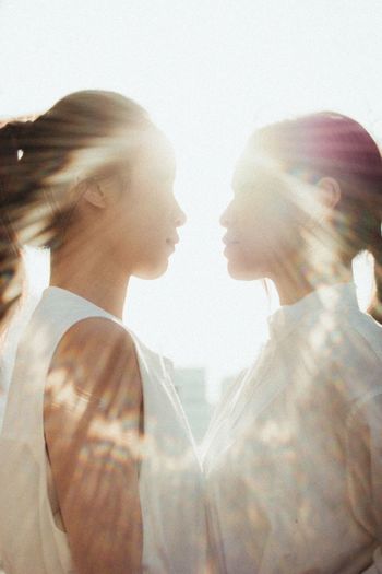 MULTIPLE EXPOSURE OF WOMAN