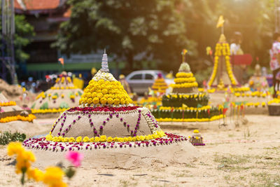 Various flowers on temple against building