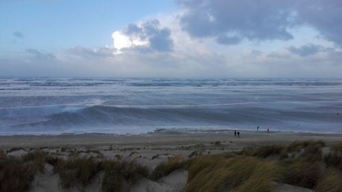 Scenic view of beach against sky